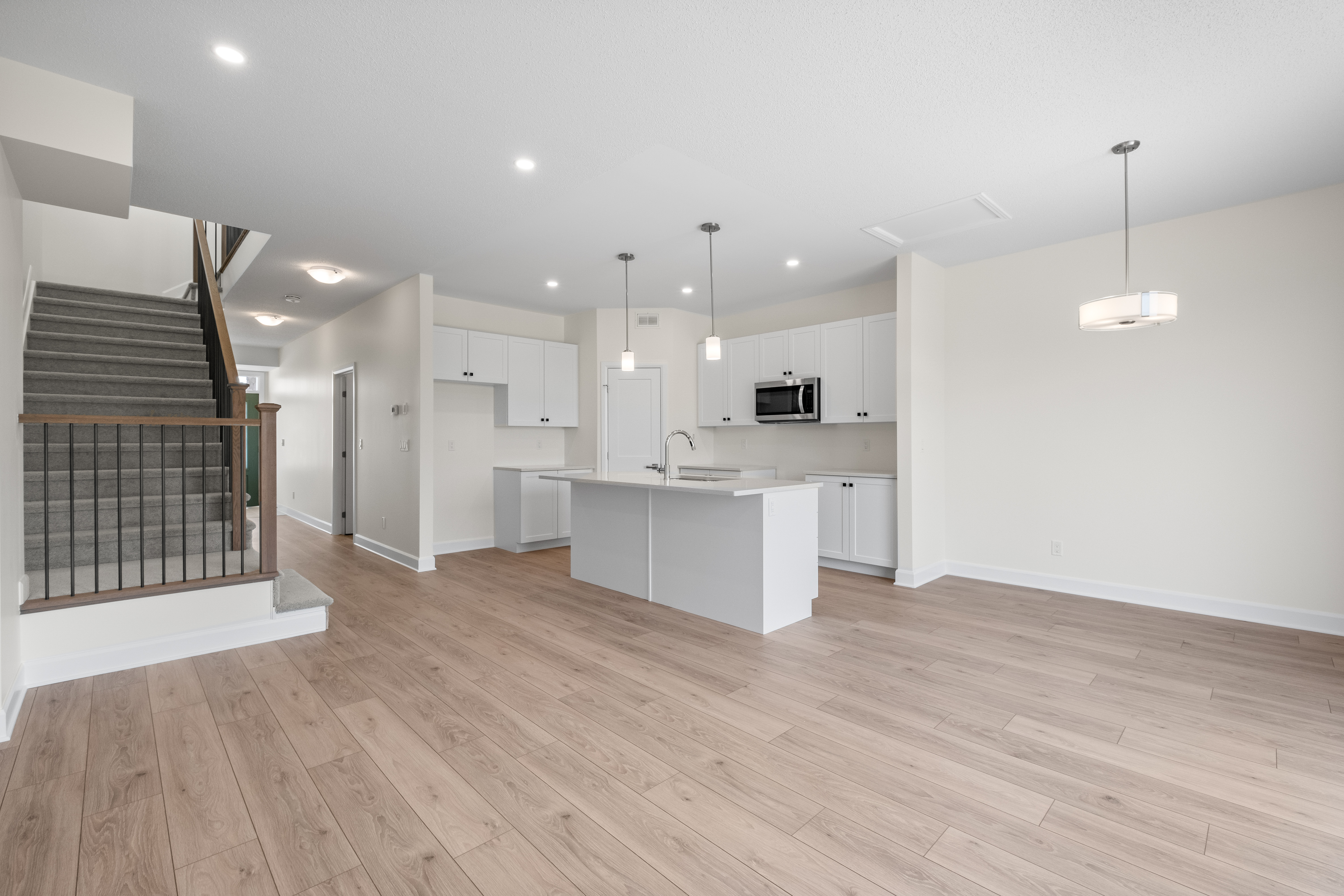 Open concept kitchen, living room and dining room