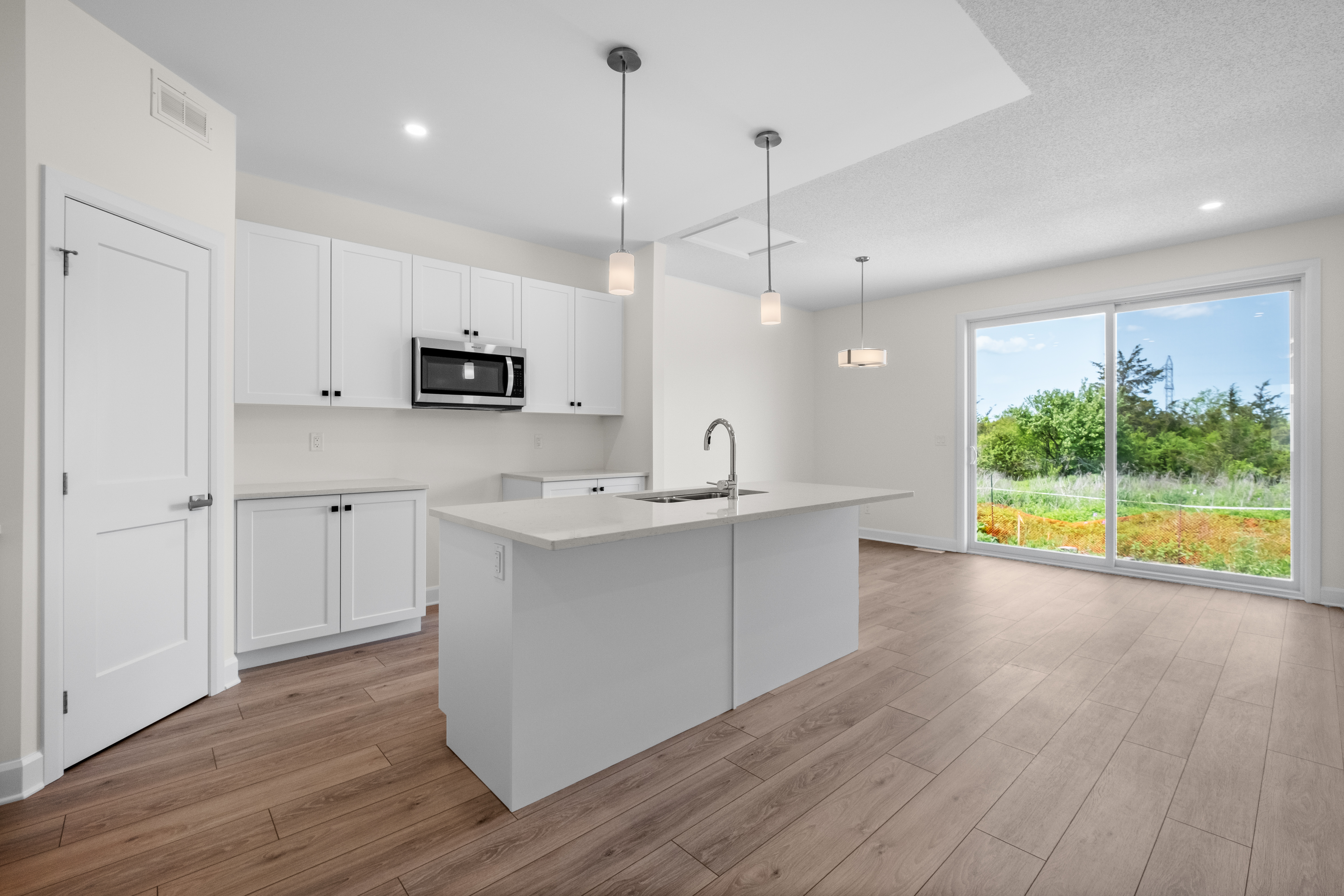 Open concept kitchen, living room and dining room