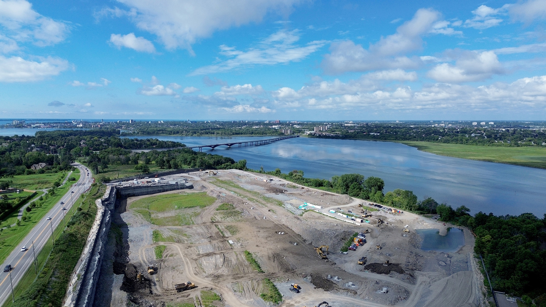 The building site for Riverview Shores, on a sunny riverside.