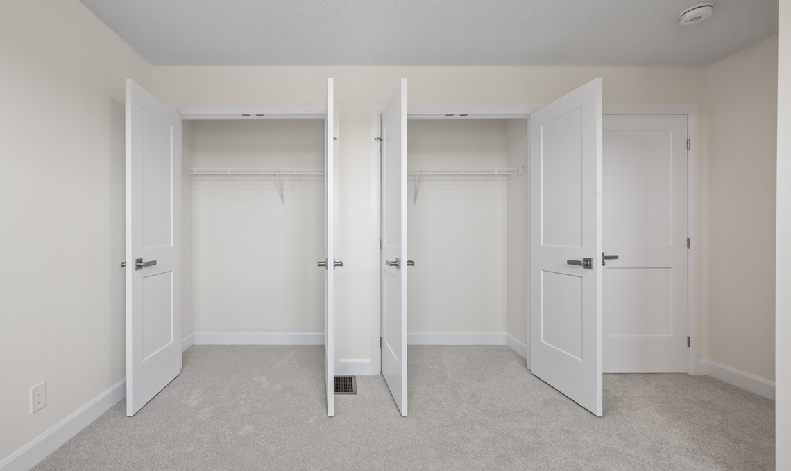 Double closets in bedroom
